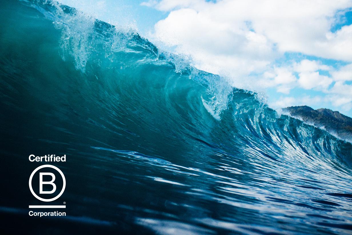 Gian blue wave with B Corp logo in left corner