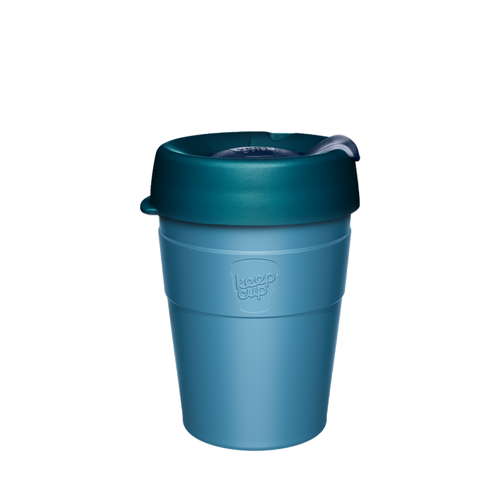 Teal KeepCup reusable coffee cup with matching lid and purple silicone band on white background