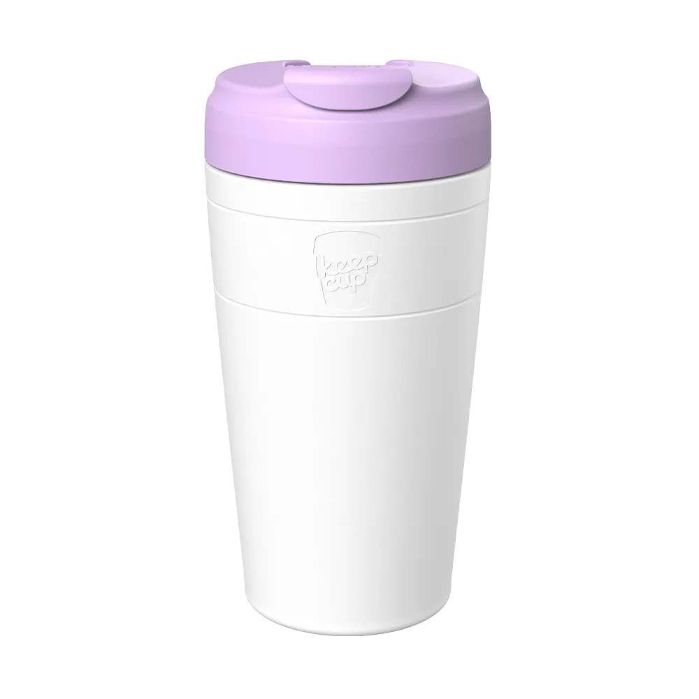 KeepCup Commuter L 16oz in White Lilac, shown from a front angle against a plain background, featuring a white cup with the KeepCup logo embossed and a lilac lid with flip-top closure.