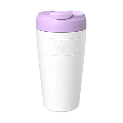 KeepCup Commuter L 16oz in White Lilac, shown from a front angle against a plain background, featuring a white cup with the KeepCup logo embossed and a lilac lid with flip-top closure.