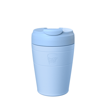 KeepCup Commuter M 12oz in Orchid, featuring a light blue cup with a matching lid, shown against a plain white background in a front-facing product shot.