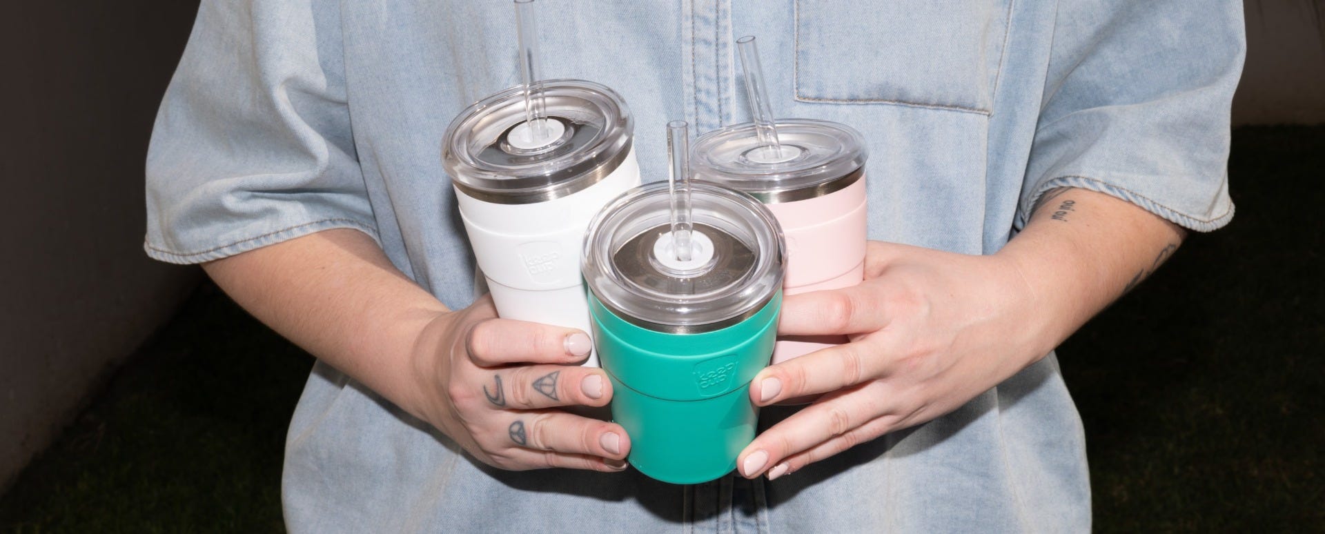 Woman holding KeepCup Cold Cup Thermal stainless steel tumblers with straw in 12oz