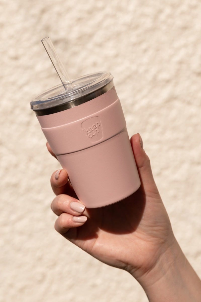 Woman holding KeepCup Sip & Chill Thermal travel Mug