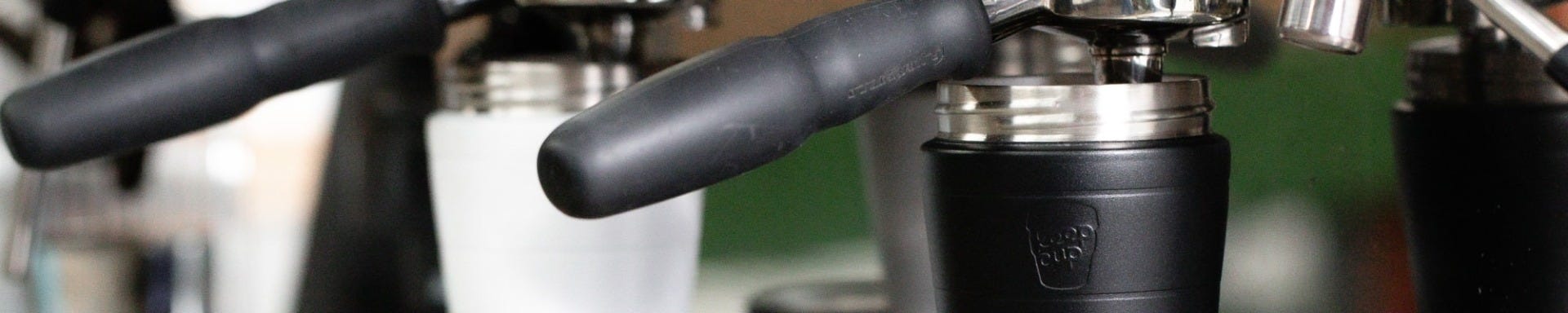 KeepCup screw fit stainless steel cup base under coffee machine group head