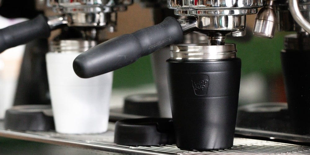 KeepCup screw fit stainless steel cup base under coffee machine group head